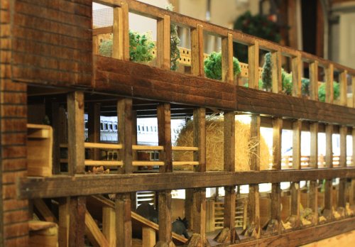 First story - large animals; Second story - "clean" and small animals; Third story - aviary and storage